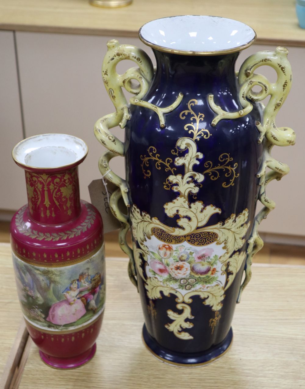 A French porcelain vase table lamp and another Continental vase table lamp